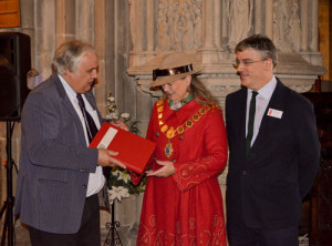 Professor Hoyle presents the Mayor with a copy of the volume.