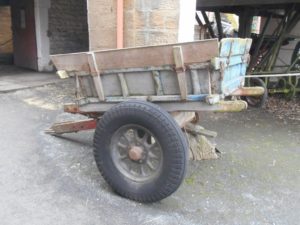 Horse-drawn 'tip-cart' modified for tractor haulage
