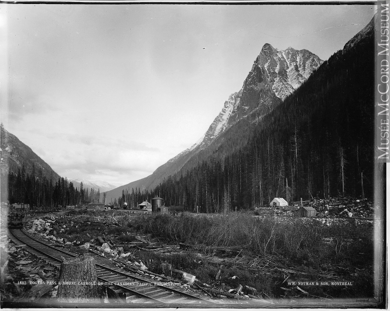 A view of Mount Carroll from Rogers' Pass, British Columbia, with the Canadian Pacific Railway tracks in foreground.