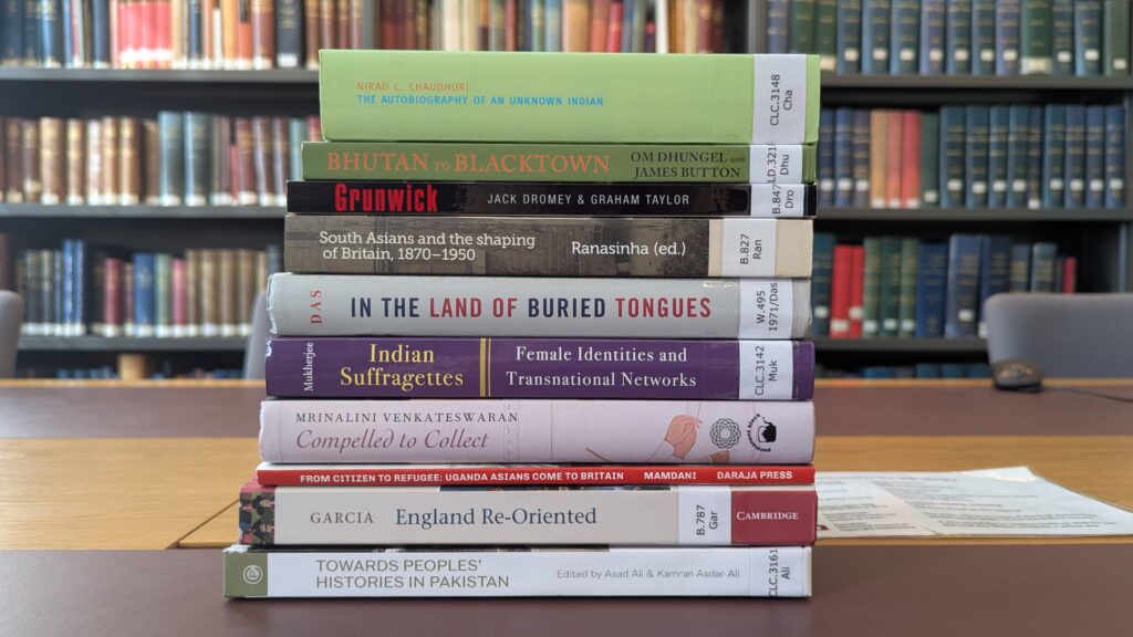 Stack of books referenced in this blog, taken on a desk in the IHR library.